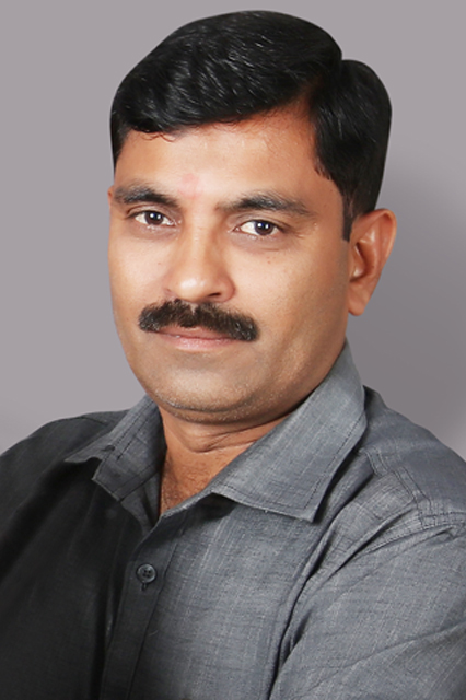 Dinesh Champaneri Executive Director